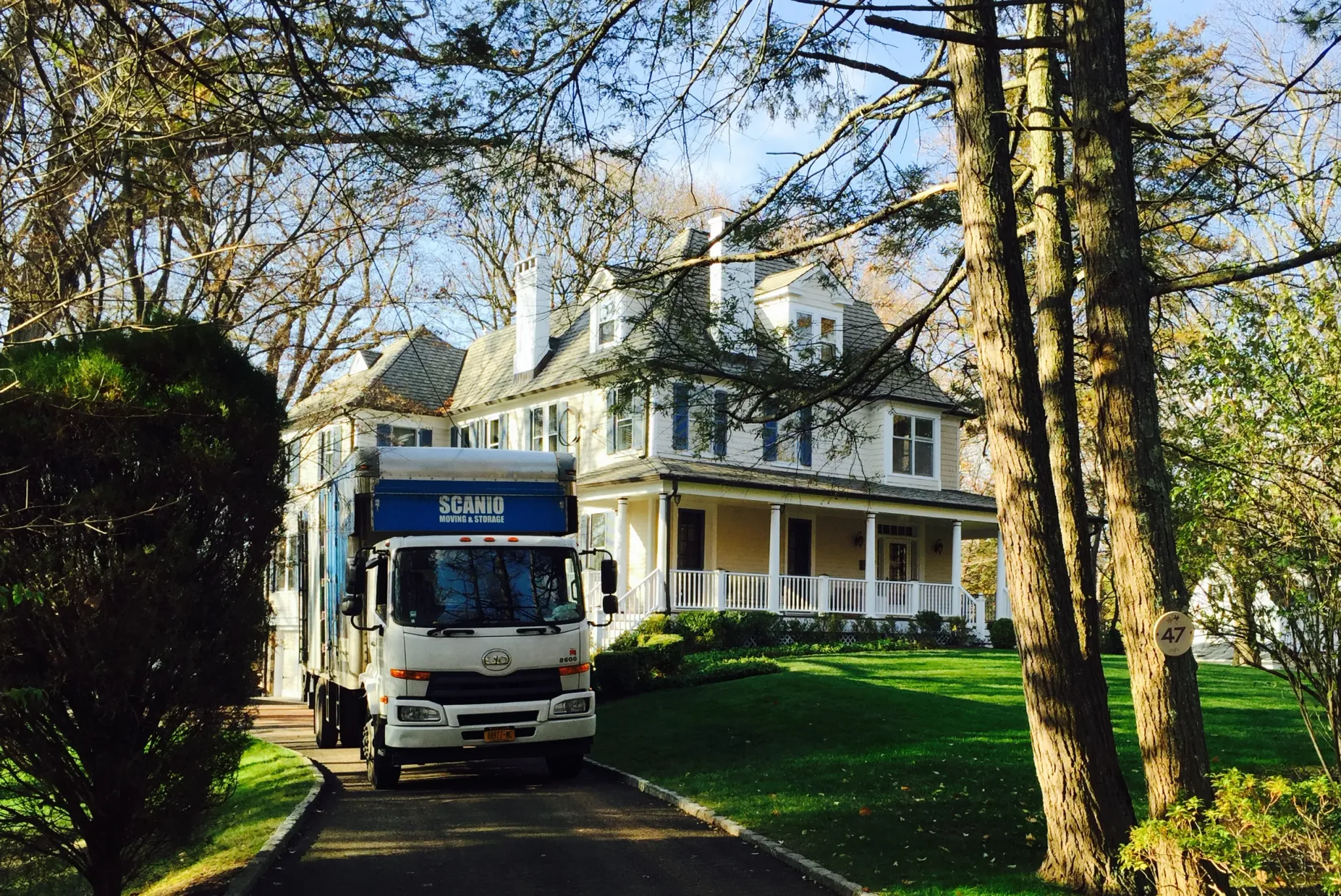 Scanio truck at a residential home