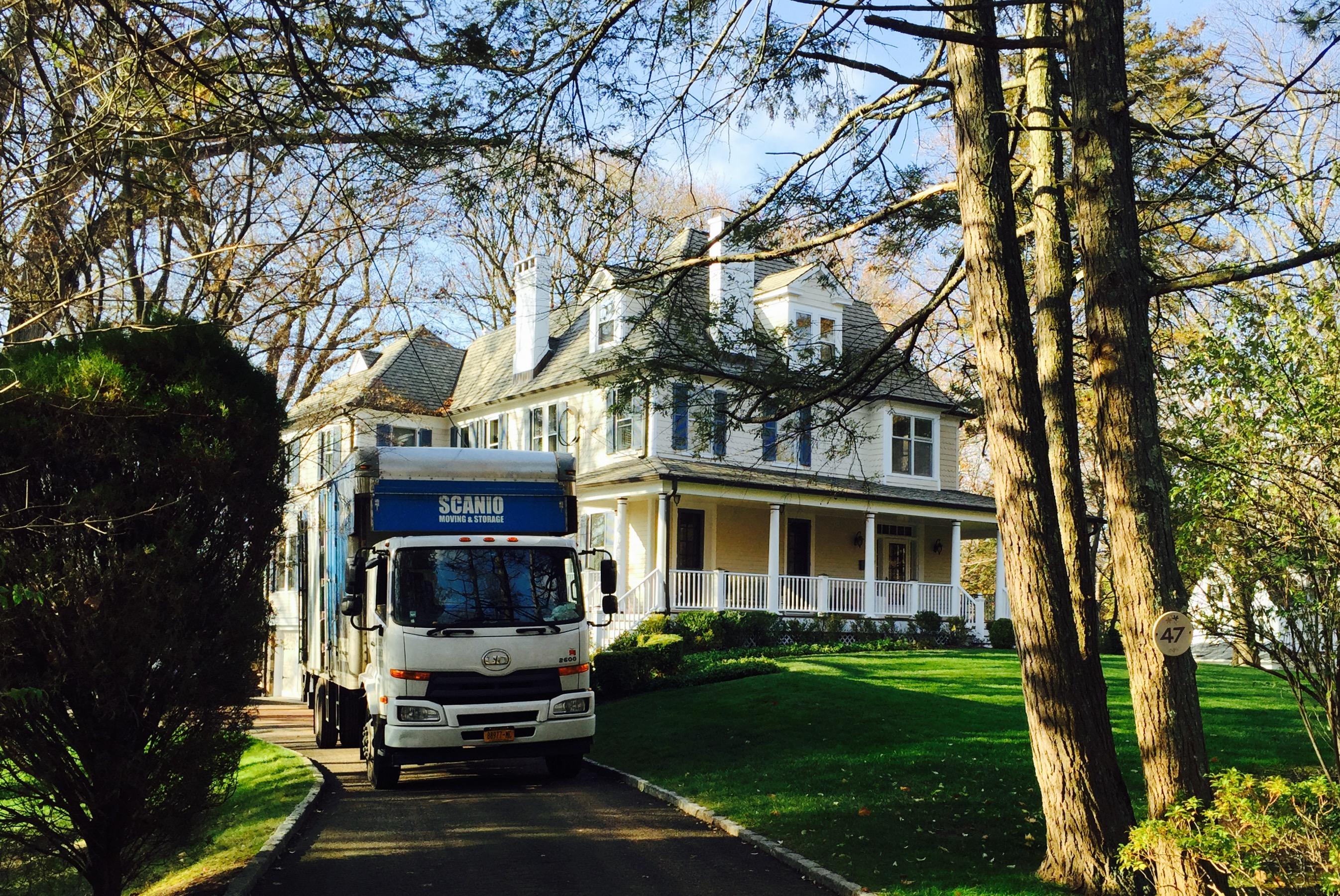 Scanio truck at a residential home
